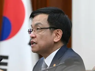 South Korea's Deputy Prime Minister for Economic Affairs departs to attend the first Japan-US-Korea Finance Ministers' Meeting