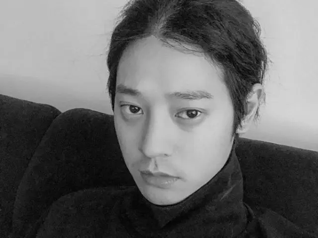 Singer Jung Joon Young, SNS update. Atmospheric photo with monochrome.