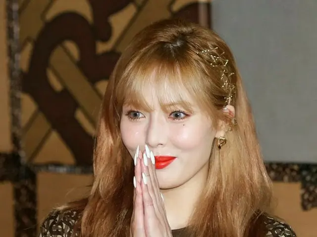 Singer HyunA attends the Burberry Collection Launch Party. The afternoon of the 