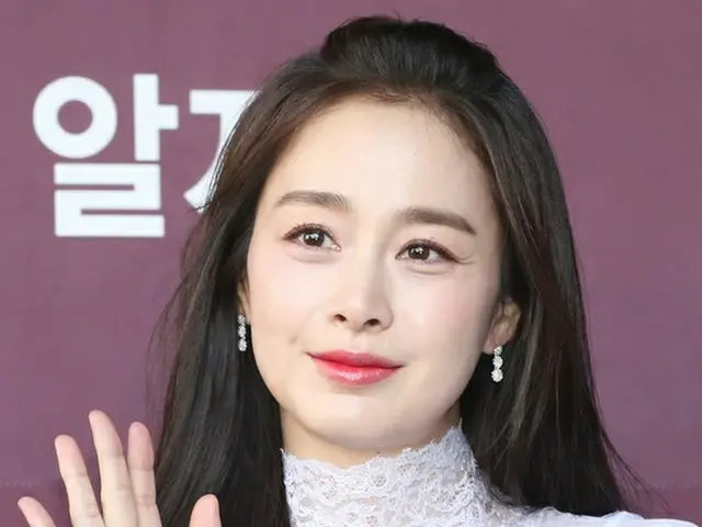 Actress Kim Tae Hee attends the collection launch event. . . 