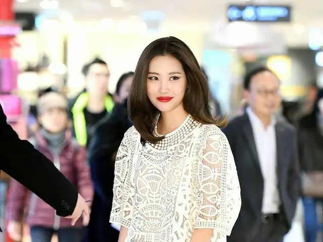 Sunmi attends a global cosmetics brand pop store opening commemoration event.