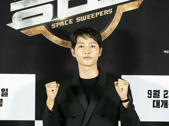 Actor Song Joong Ki attends an online movie "Victory" production showcase.