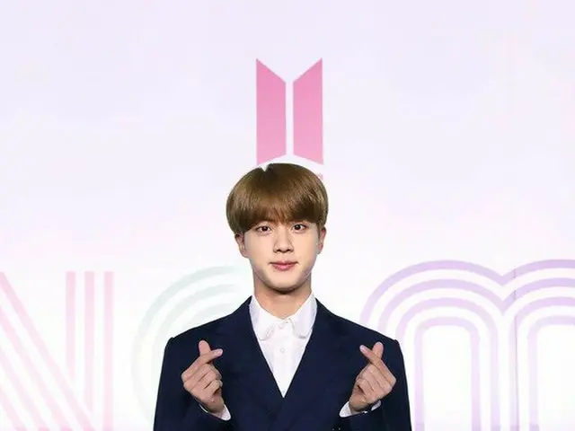 Big Hit revealed that JIN's enlistment was determined to be postponed until the 