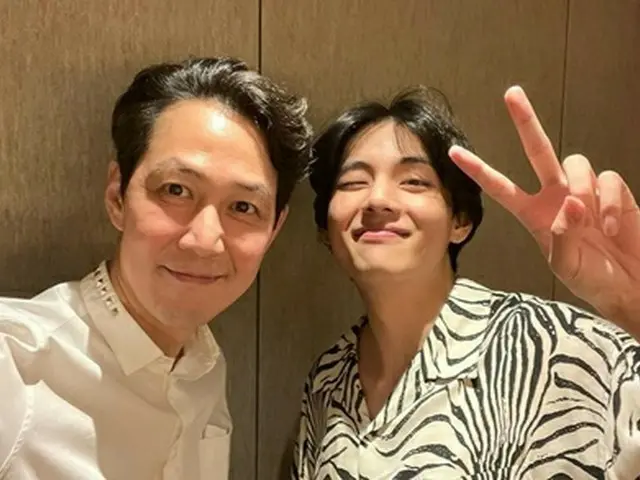 Actor Lee Jung Jae, released the two shot photo with V (BTS). . .
