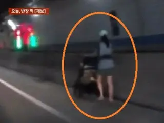 Why is a woman pushing a stroller in a tunnel? …“Is it a real ghost?” = South Korea