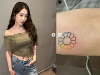 BoA reveals new tattoo...flowers neatly carved on her arm