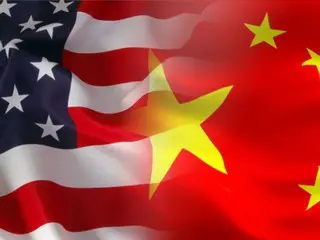 Chinese Foreign Minister Wang Yi visits the U.S. Embassy...and pays tribute to "Mr. Kissinger"
