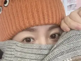 Actress Han Ji Min wears a warm outfit with a knit hat and scarf...She reveals her cute figure