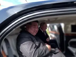 President Putin presents Kim Jong-un with a car...Russian luxury car "Aurus"?