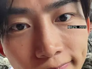 2PM's Taecyeon looks so dignified in military uniform... participating in military reserve training