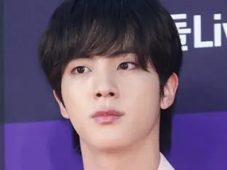 Japanese woman surprise kisses BTS member JIN... investigation dropped despite sexual harassment?
