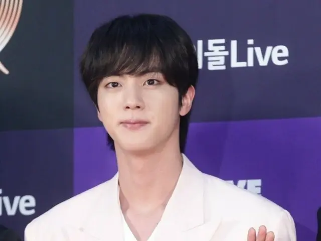 A Japanese woman in her 50s who ambush-kissed BTS member JIN turned herself in after entering Korea...sent to prosecutors