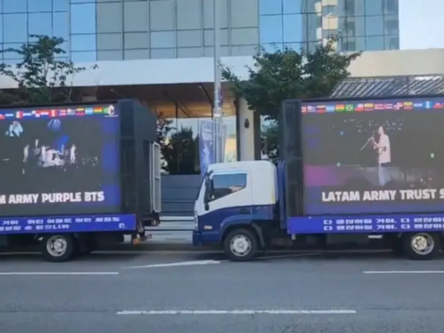 "BTS" is 7 members... Overseas fandom sends banners and trucks to HYBE in support of the entire group