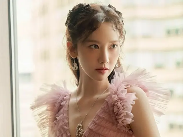 Im Yuna, the Yoon Producer shaking up Shanghai... in a pure dress