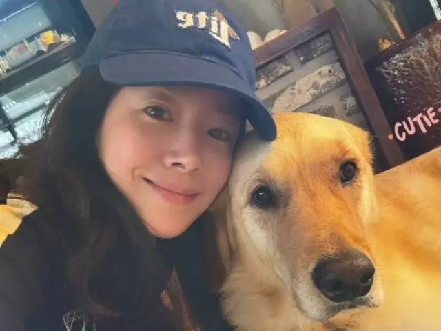 Actor Han JIMIN shares a heartwarming photo with a golden retriever